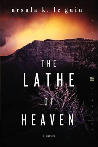 The Lathe Of Heaven cover: a dark mountain and a bare tree in the background, burning orange sky