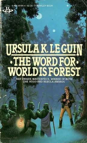 A vintage cover of The Word For World Is Forest by Ursula K. Le Guin. "Her unique masterpiece. Winner of both the Hugo and Nebula awards." A man with a rifle facing 4 furry, green, short people in a dark and foggy forest. One of the green people is carrying a lantern and a knife, another is dressed in a robe and is carrying a staff. A native (green) adult and a child are looking at the man from behind, having just stepped out of the tree.